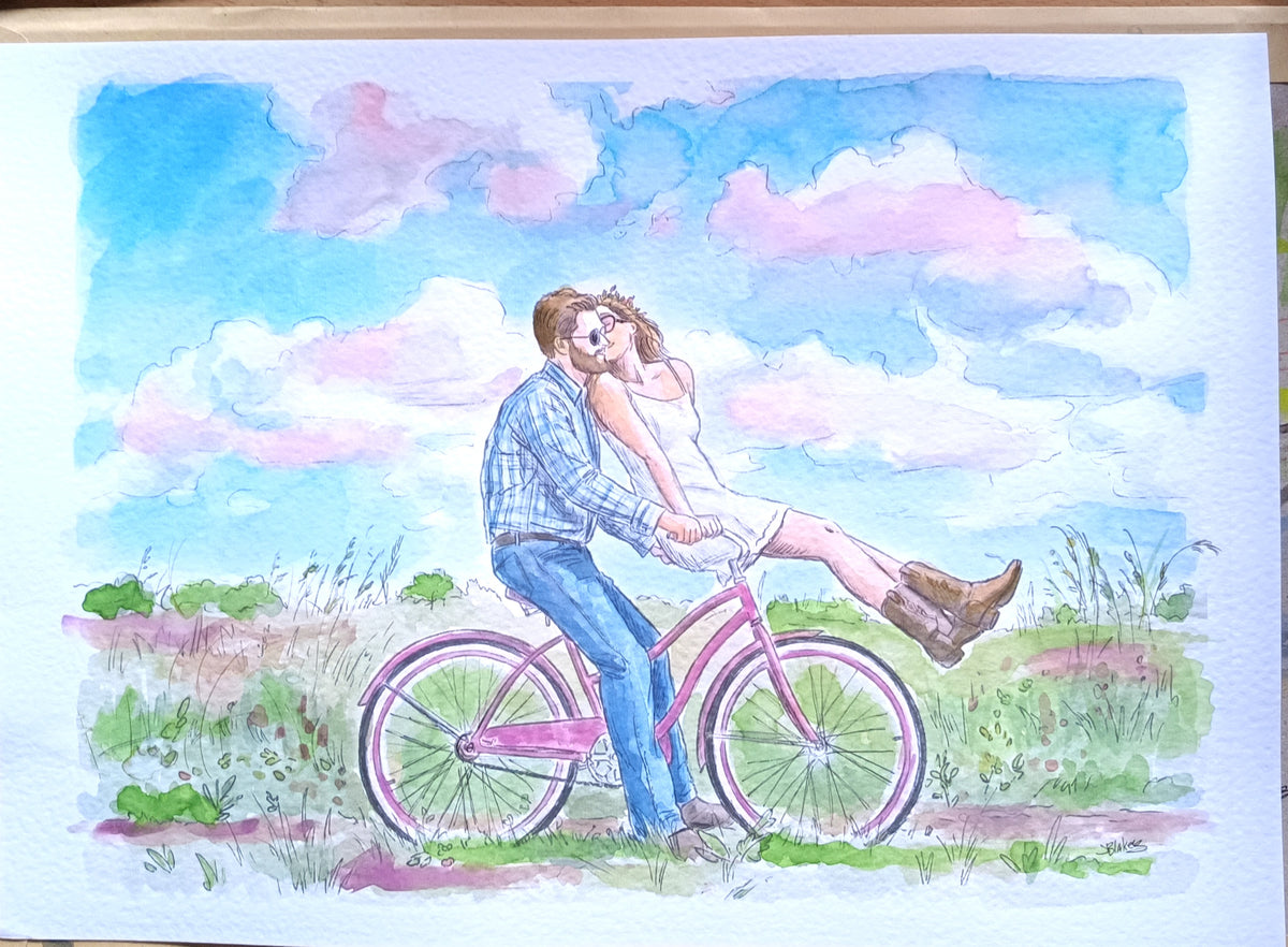 Watercolor illustration of a couple riding a pink bicycle through a field under a blue sky with pink clouds