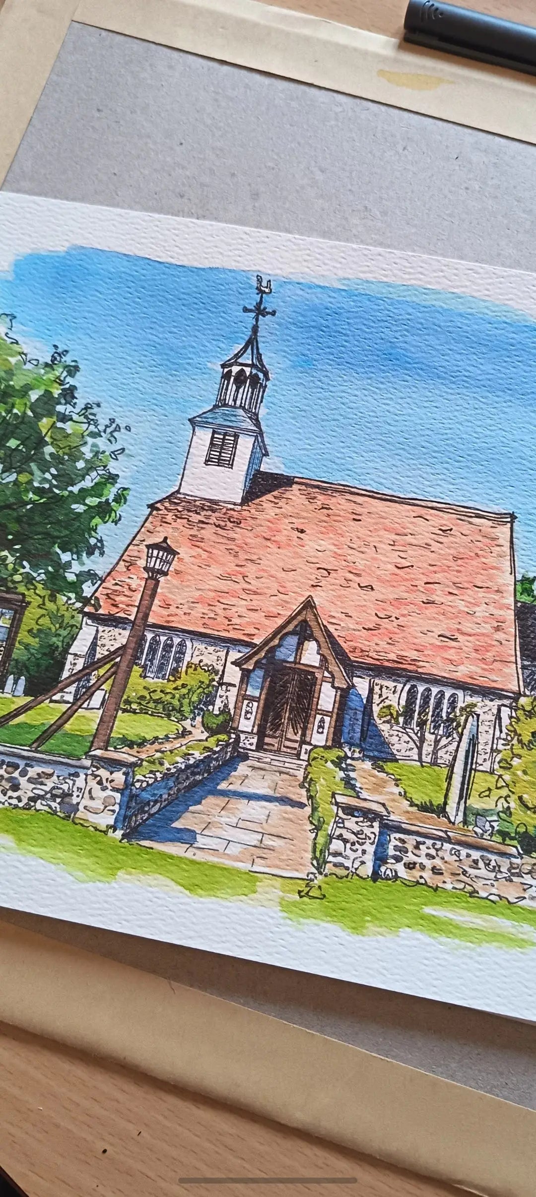 Art on a Wall custom watercolour wedding venue painting of a stone church with a red roof